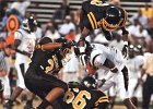 UnionFB-defense copy  A trio of Union defense, including Fred Bates (3, top) and Phillip Rice (66, bottom), and Kendrick Neal (34, left), stop  Fairfield Central&#39;s Larry Perry (2), during the first half of action at Union High School, 9-16-05.